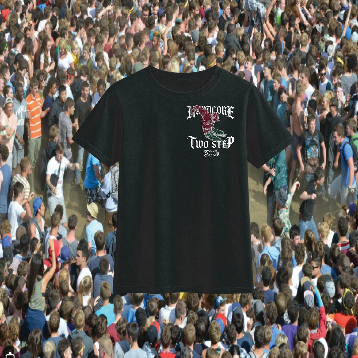 A black short-sleeve graphic t-shirt featuring a 'Two Step' band logo with a red and green illustration, displayed against a background of a crowded outdoor concert crowd.
