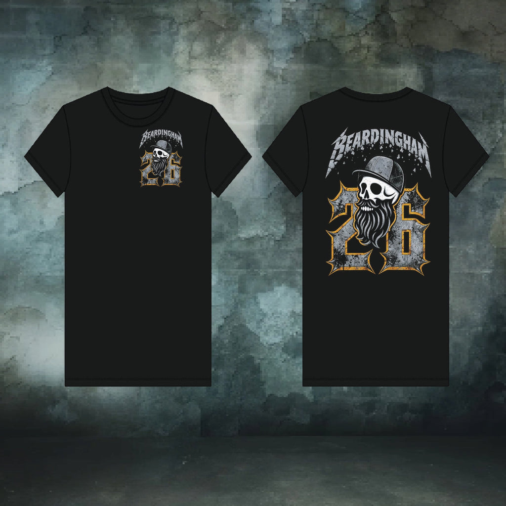 Two black short-sleeve T-shirts shown front and back against a textured dark gray wall. The front has a small chest graphic with a skull, the word 'Beardington', and the number 26 in a distressed gold-and-white design.