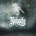 White gothic-style 'Nobody' text with a white skeletal raven above it, centered on a distressed dark gray and green textured background.